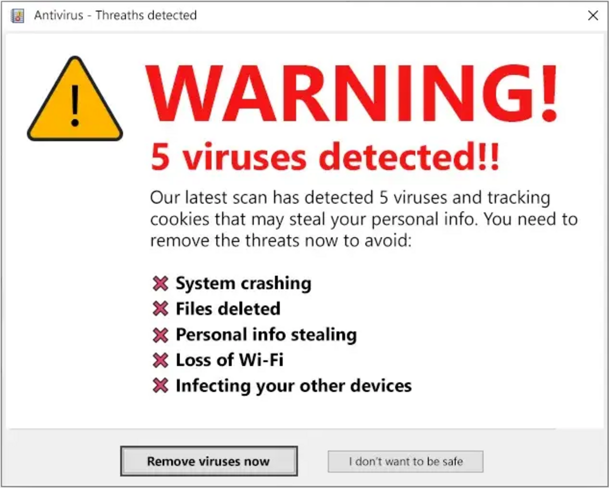 A computer screen displays a fake 'Antivirus, Threats detected!' warning popup, a common example of scareware. The message claims '5 viruses detected!!' and lists potential dangers like 'System crashing' and 'Personal info stealing', urging the user to click 'Remove viruses now'.