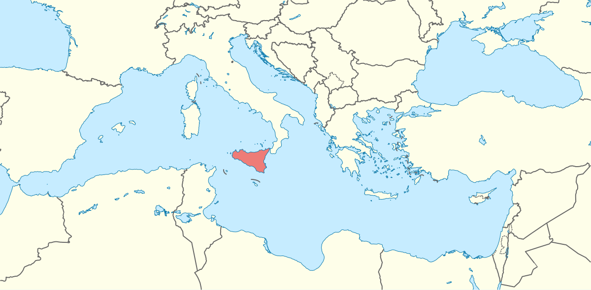 Map of the Mediterranean Sea region, highlighting the island of Sicily in red. The map shows surrounding landmasses including North Africa, the Italian mainland, and Greece.