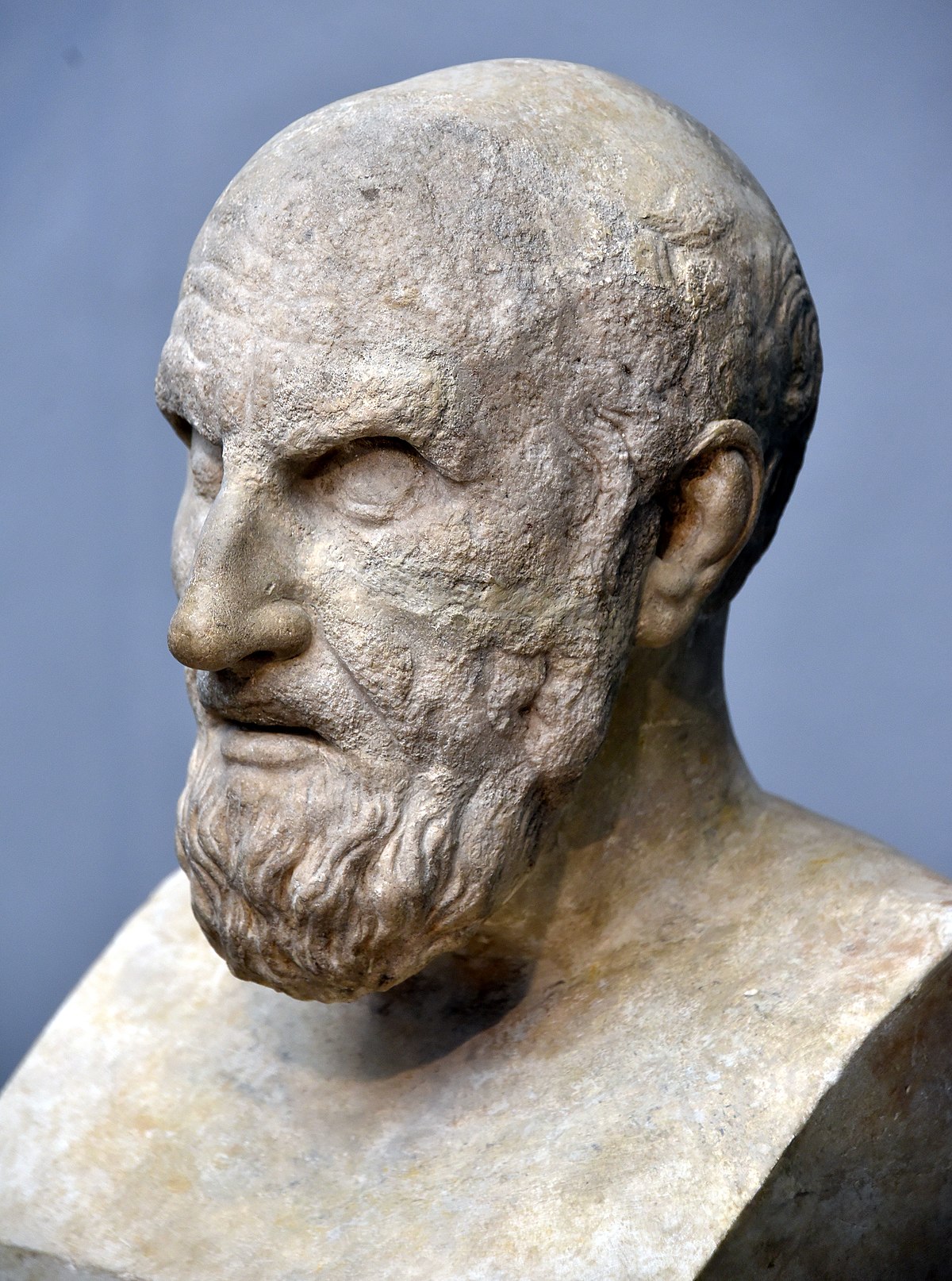 Marble bust of Chrysippus, the third leader of the Stoic school, a Roman copy from the 1st century CE of an original from circa 200 BCE. The sculpture depicts a man with a stern expression, short beard, and receding hairline.