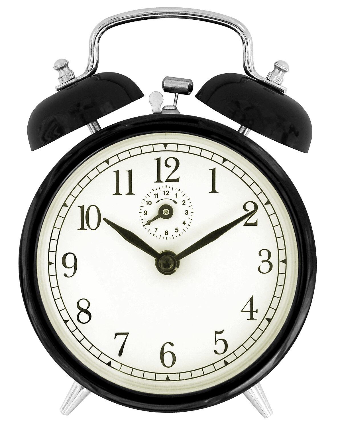 Black wind-up alarm clock with a white face, black numbers, and two bells on top. The clock displays the time as approximately 10:10.