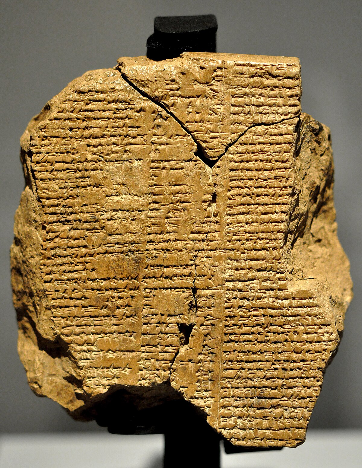 Tablet V of the ancient Akkadian Epic of Gilgamesh, a cuneiform tablet containing examples of dream interpretation. The clay tablet is inscribed with dense lines of cuneiform script.